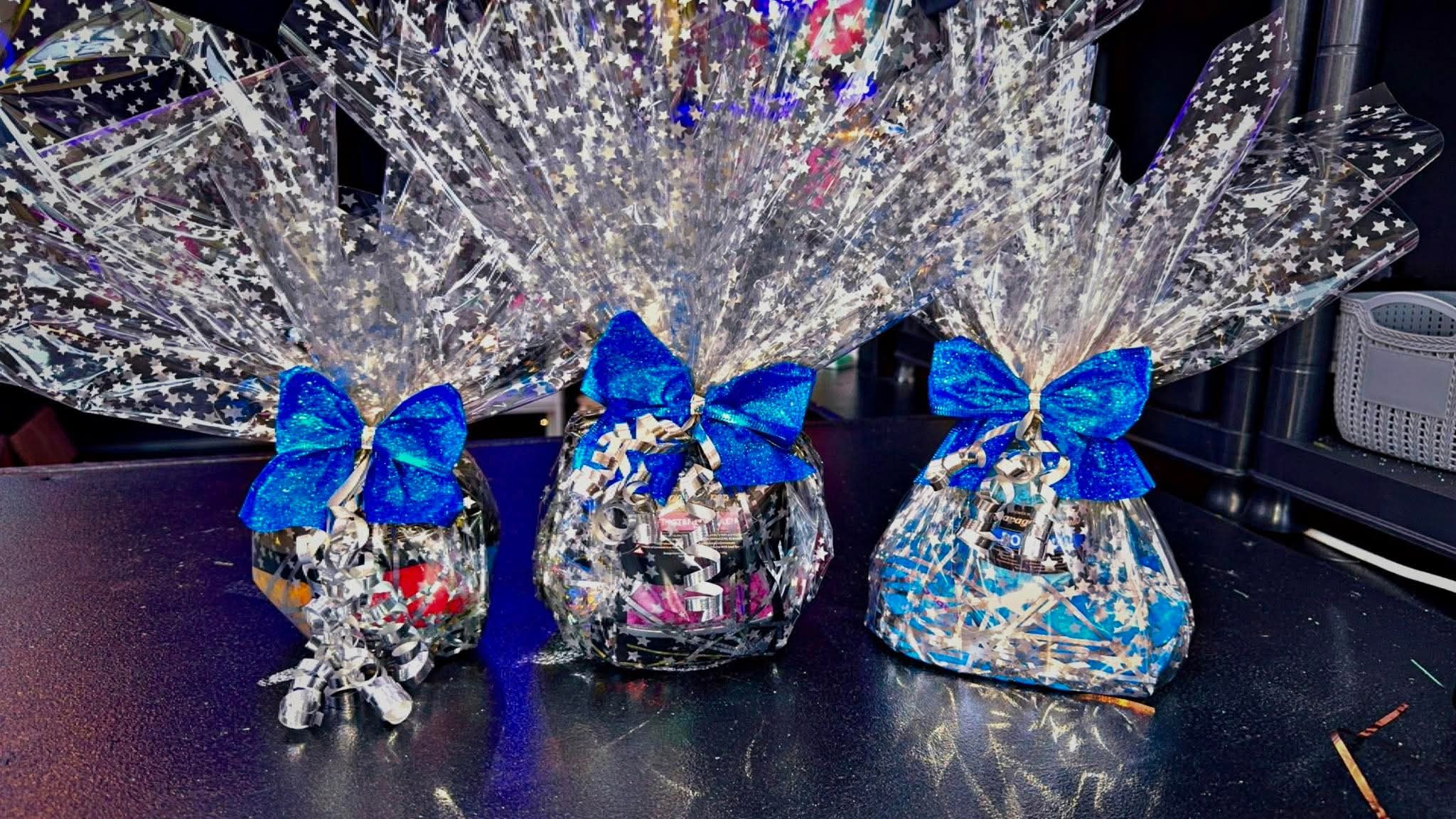 Savage Aromas gift hampers with blue bows